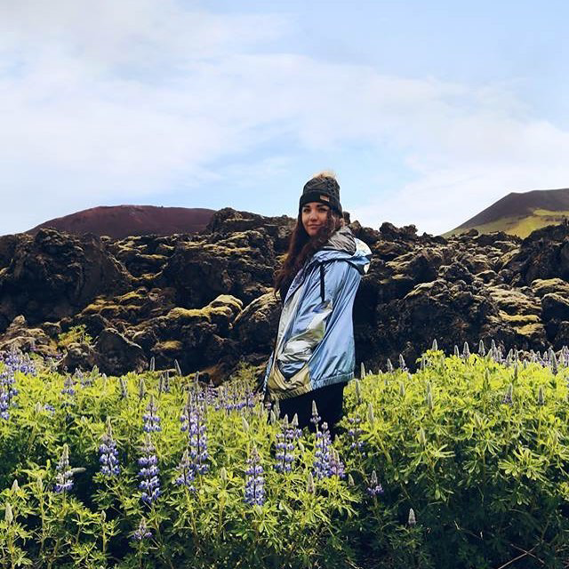 Photo of Mai Sari illustrating in her studio